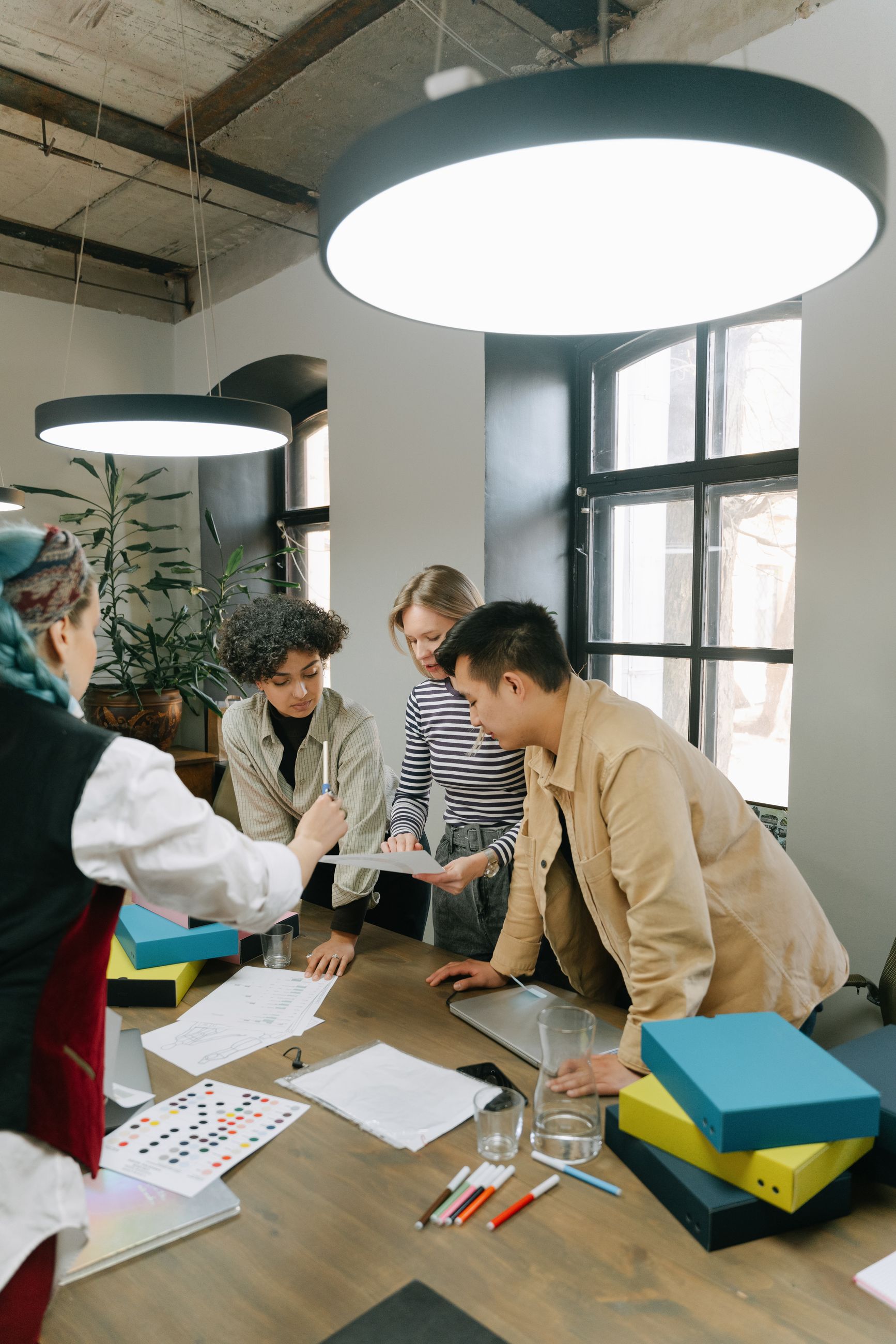 A team collaborating in a warm modern office